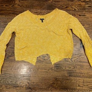 Mustard colored V-necked cropped Express sweater. Size small.